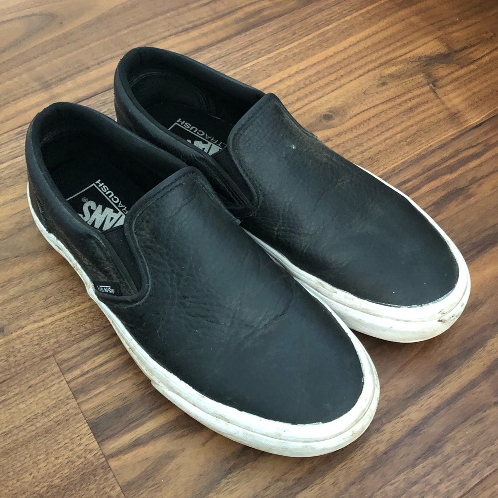 black leather slip on vans